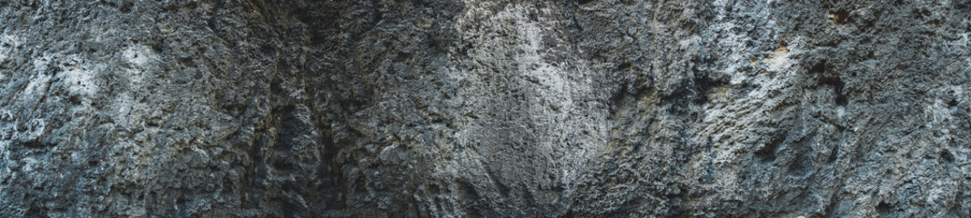 Grunge Rough structure. Silver Wall. Rock background. Rock texture. Black texture. Dark marble. Stone background. Rock pile. Paint spots. Rock surface with cracks. Abstract texture.