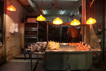 中国の生鮮市場の肉屋さん