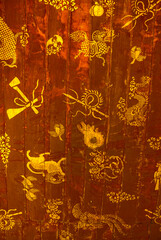 Red ceiling with gold painted symbols, Wat Chom Phet, a hill temple in Luang Prabang area, Laos, Asia