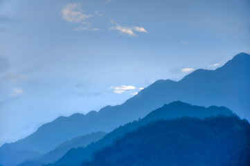 clouds over the mountains in sunset
