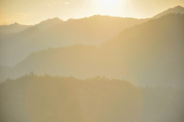 clouds over the mountains in sunset