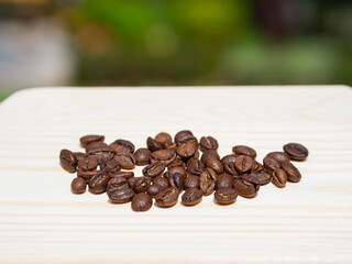 Coffee beans on wooden tray