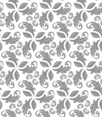 Floral vector ornament. Seamless abstract classic background with silver leaves. Pattern with repeating floral elements. Ornament for wallpaper and packaging