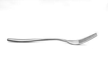 The metal shiny fork on white
