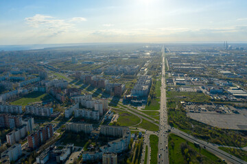 Fototapeta premium Togliatti view of the southern highway towards AvtoVAZ. Aerial city view in summer