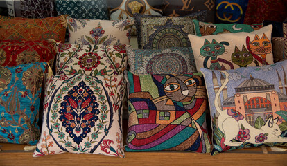 Colorful pillows with flowers and Istanbul cats