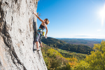 Fototapeta premium girl rock climber