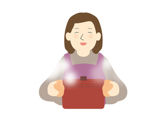 赤い鋳物の鍋を持って笑う女性　湯気あり