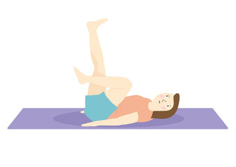 床に寝てエア自転車漕ぎをするダイエット中の女性