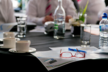 Obraz na płótnie Canvas A pair of ladies glasses at a leadership conference