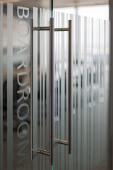 Double door to the boardroom with frosted privacy strips