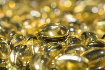Background of scattered fish oil omega pills