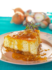 piece of cheese cake with on onion chutney topping - 510064305