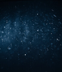 Abstract swirly blue heart bokeh background.