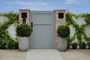 gated entry to contemporary modern home