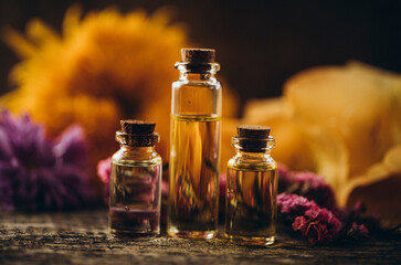 essential oil and flowers. Oil glass. Photo. Spa. Aroma. Herbal. 