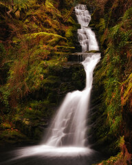 Fototapeta na wymiar O'Sullivans Cascades waterfall in Kerry mountains, Ireland