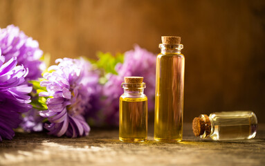 essential oil and flowers. Oil glass. Photo. Spa. Aroma. Herbal. 