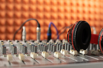 Plakat Headphones and sound mixer radio station. Music concept sound record studio