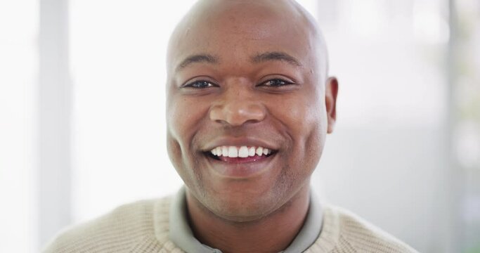 Portrait of one mature African American man with a bright smile and deep dimples looking content and attentive against bright copyspace background. Happy black man with natural white and healthy teeth