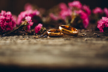 wedding rings on a flower