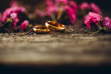 Couple rings. wedding rings and flowers