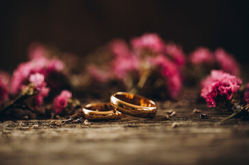 wedding rings and flowers