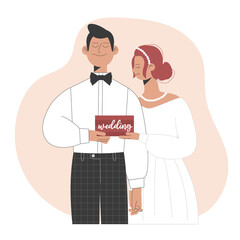 Wedding couple holding a wooden sign with the word 