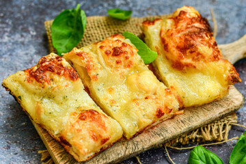   Italian  Focaccia  four cheese with crispy crust   Full 72 hour pizza dough   fermentation   method. Roman style pizza slice 