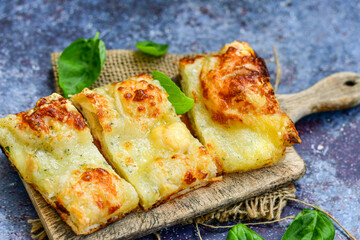   Italian  Focaccia  four cheese with crispy crust   Full 72 hour pizza dough   fermentation   method. Roman style pizza slice 