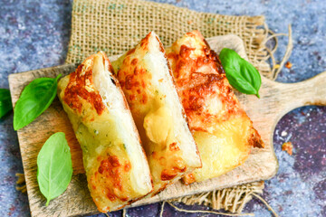   Italian  Focaccia  four cheese with crispy crust   Full 72 hour pizza dough   fermentation   method. Roman style pizza slice 