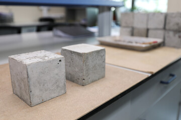 Modern laboratory for testing road samples and materials concept. Cement concrete samples for...
