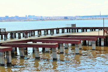 Fototapeta premium An old, empty pier on the lake