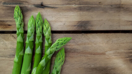 Fresh asparagus on the table. - 510083739