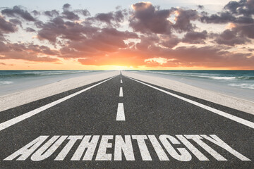 Authenticity word for genuine concept written on a highway in nature.