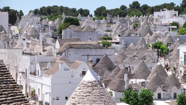 Street scene from the famous little town of Alberobello, one of the most touristic cities in Italy 