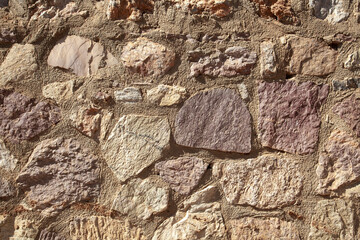 Stonewall is made of violet and beige stones.