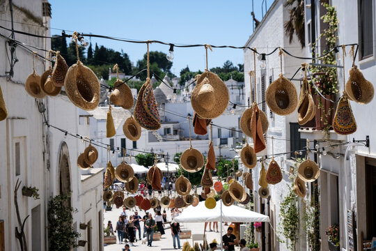 Street scene from the famous little town of Alberobello, one of the most touristic cities in Italy