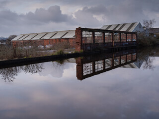 Sheffield canal and industrial ruins reflected