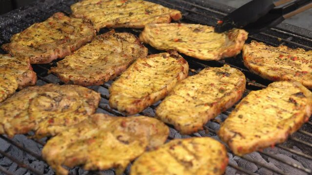 Spicy Pork Beef Bacon Being Grilled Over Bright Glowing Coals Broasting On Fire. Lunch celebration Party Barbecue. Outdoor Cooking. Cook Prepares Oriental Dish In Kitchen. Junk Food, Healthy Lifestyle