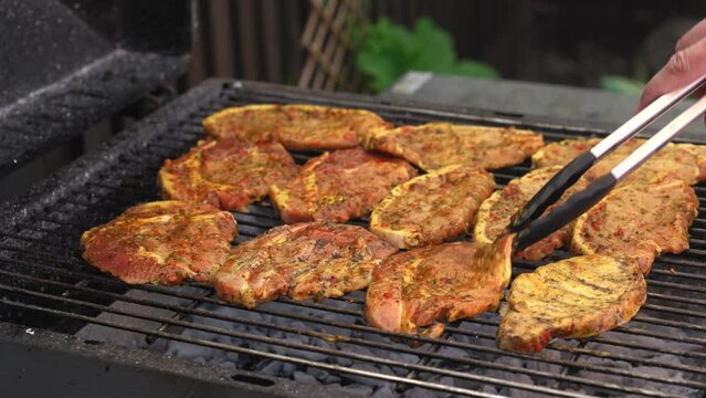Spicy Pork Beef Bacon Being Grilled Over Bright Glowing Coals Broasting On Fire. Lunch celebration Party Barbecue. Outdoor Cooking. Cook Prepares Oriental Dish In Kitchen. Junk Food, Healthy Lifestyle
