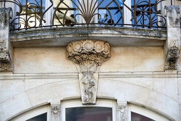 Building with windows and doors with art nouveau floral motifs in Leiria, Portugal