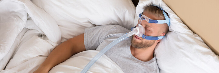 Man With Sleeping Apnea And CPAP Machine - obrazy, fototapety, plakaty