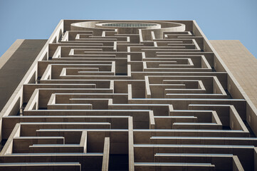 Modern glass skyscrapers in Dubai with blue sky in background. Impressive architecture of financial district and Dubai marina. 