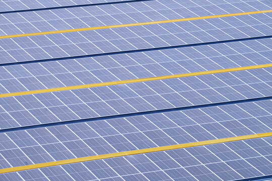 Solarcell panel installed on the roof of a factory to produce clean energy from the sunlight