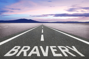 Bravery word written on a highway for the concept of courage on your journey.
