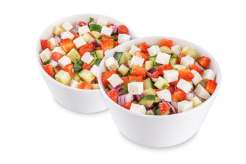 Strawberry Feta cucumber salad in a bowl on a white isolated background