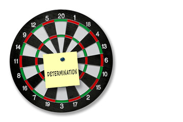 Determination word written on dartboard for inspirational motivation concept.