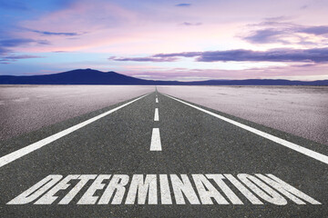 Determination word written on a highway for inspirational motivation concept.