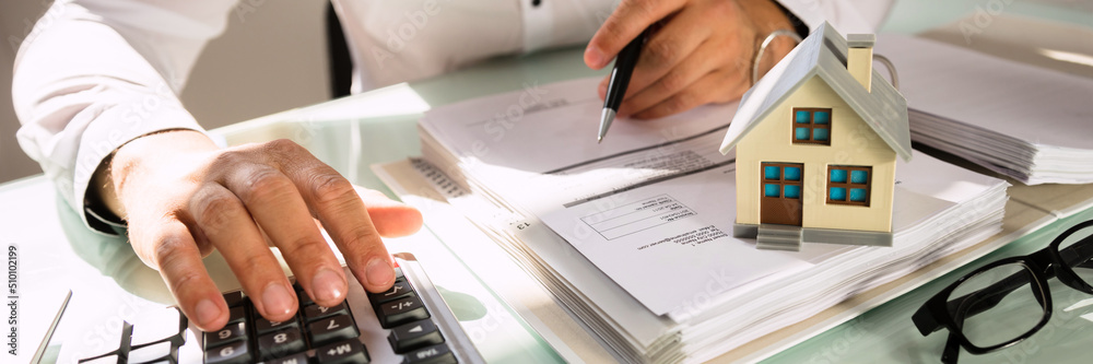 Poster businessman's hand calculating invoice